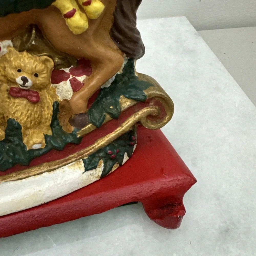 Cast Iron Christmas stocking hanger Nutcracker rocking horse double hook Vintage